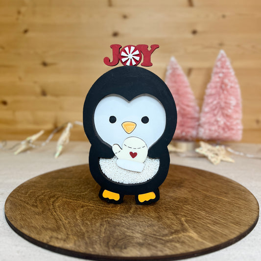 Penguin shaker with 2 toys